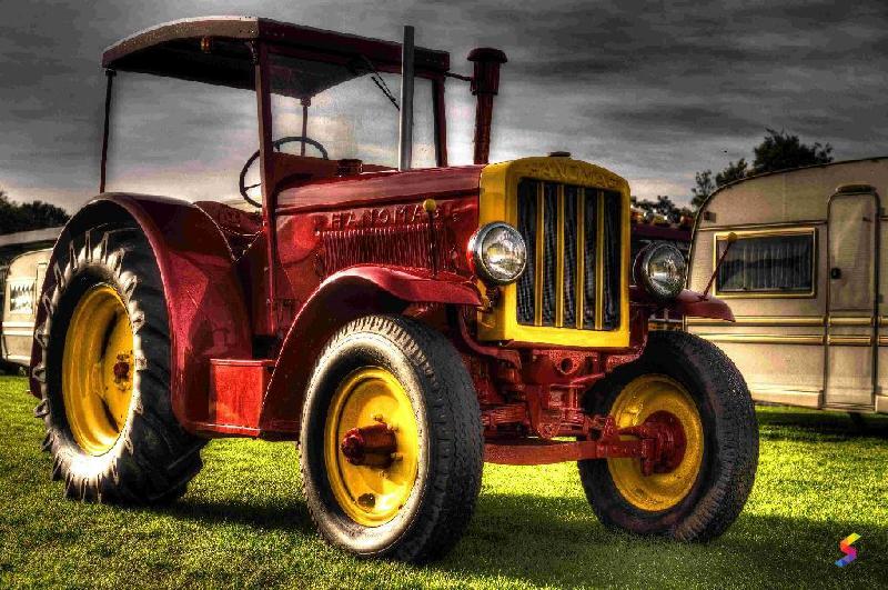Define Tractor, Tractor Meaning, Tractor Examples, Tractor Synonyms